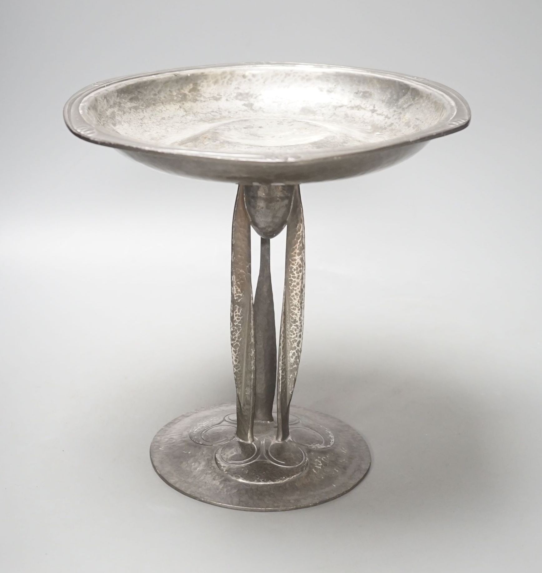 A Liberty's Tudric tazza, designed by Archibald Knox, stamped English pewter 01161, 25 cms high.